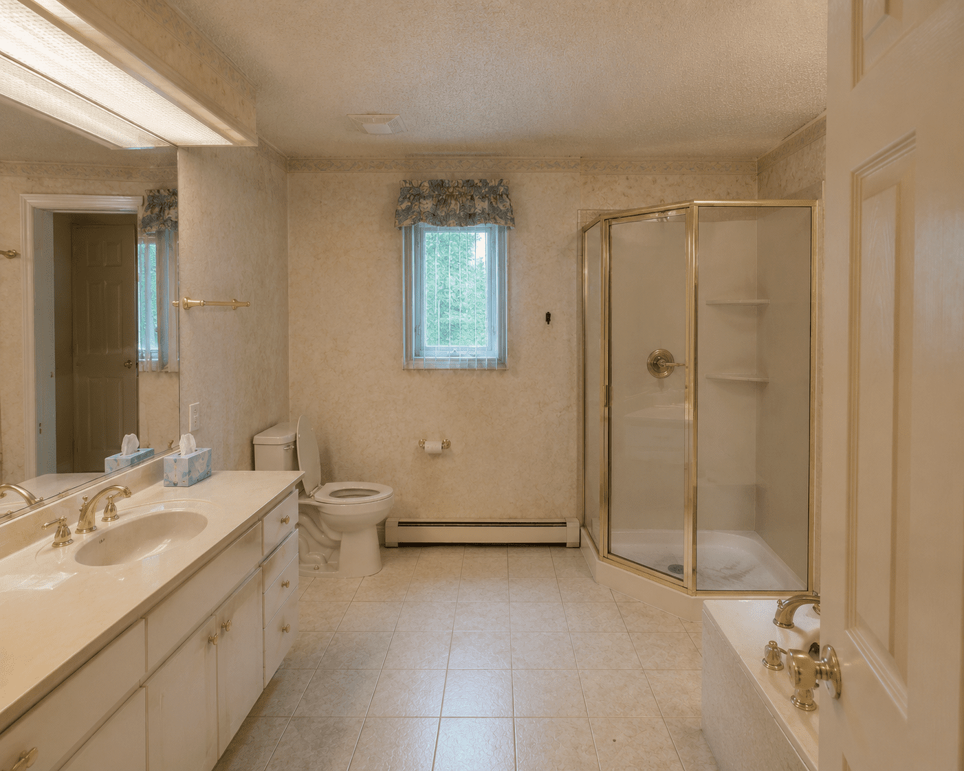 Before — almond 1980s bathroom in Olney, MD